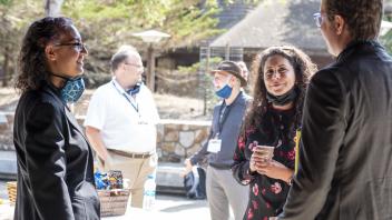 Dahlia Garas, Daniel Sperling, and conference attendees