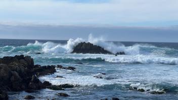 waves crashing on rocks